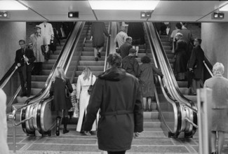 Moving stairs in the railway station passage «Shop Ville», 1970.