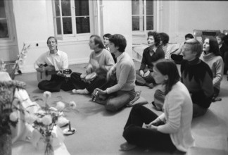 Adherents at meeting with guru Maharaji, 1973.