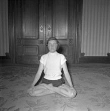 Woman doing yoga, 1953.