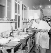 Geneva 1950: Cooks cooking in the kitchen of the du Rhone hotel.