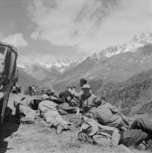 Farmers resting in the meadow, 1955.