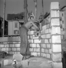 Bricklayer at Work, 1953.