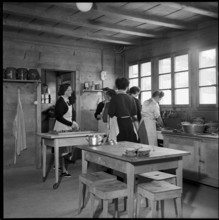Girl scouts in the kitchen, 1952.