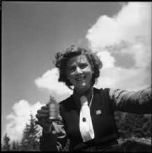 Girl scout drinking, 1952.