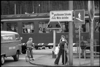 Sign for turning off the engine in front of a gate, 1972.