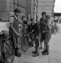 Basle, boys cleaning bicycles; 1941.