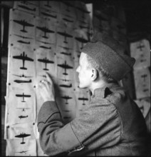 Antiaircraft soldier at aircraft table, Valais 1940