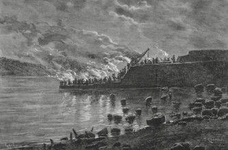 Cudillero, Asturias, Spain. Night work at the construction of the new quay, taking advantage of the