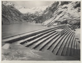 Lake Fregabolgia the building of the dam. Carona, Italy