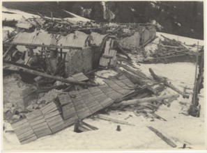 Old rural building destroyed by the snow in Carnia, Italy