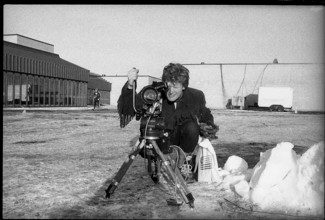 Olympic games Lake Placid 1980: Peter Muller with film camera.