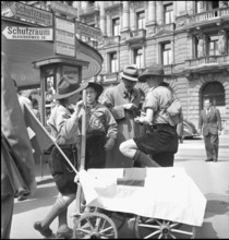 Zurich: Boy scouts collecting money on the street 1942.