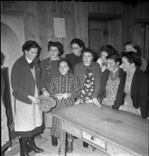 Boy raffling in Ardez, 1941.