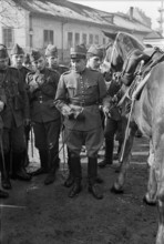 Soldiers, horses; 1940.