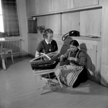 Tibetan woman with traditional textile work, Waldstatt 1963.
