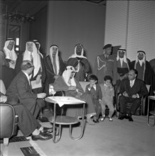 King Saud (c) receives Abdel Hassuna (l), Geneva 1957.