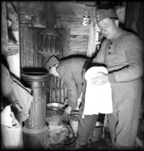 Soldiers of air raid defence housekeeping, Valais 1940.