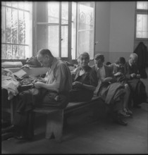 Refugees;  tailoring; 1945.