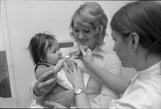 Vaccination of a baby at Pflegerinnenschule Zurich 1973.