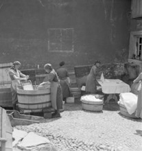 Women washing at the Hinterrhein, 1941.