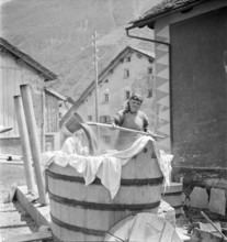 Women washing at the Hinterrhein, 1941.