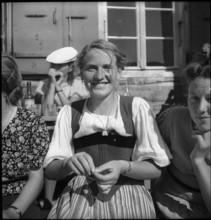 Young lady farmers at mountain festival in Switzerland, 1940.