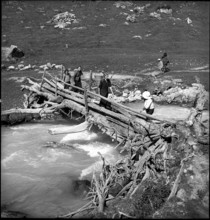 Farmers walk to the cheese donation in the Turtmanntal valley, Switzerland, 1940.