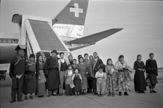 Tibetan refugees arriving at Zurich airport 1963.