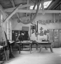 Stonemason studying plan, stonemasons' lodge Berne 1941.