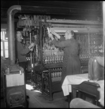 Silk ribbon weavers working, 1948.