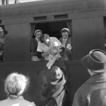 Babies from Hungary at Buchs train station 1956.