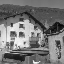 Hinterrhein: girls at a fountain; 1961.