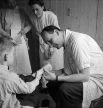 Disabled children at the doctor's, 1945.