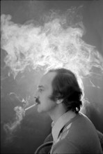 Man smoking cigarette, 1973.