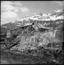 Avalanche in Andermatt; damaged buildings after thaw; 1951.