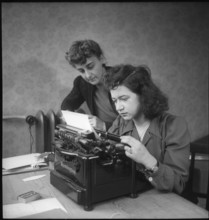 Woman typing, Zurich 1945.