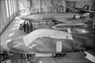 Swiss military jet P16 in hangar of FFA, Altenrhein 1955.