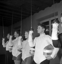 Voluntary pre-instruction: fencing, ca. 1950.