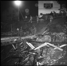 St Gallen; search for missed workers in excavation; 1957.
