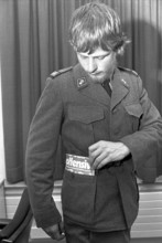 Soldier with servicemen magazine Offensive: 1971.