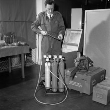 Equipment in the armoury of the civil defence headquarters, 1966.