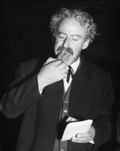 Zarli Carigiet eating a sausage, 1961.