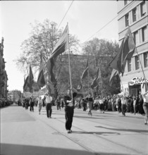 Standard-bearer at May Day rallies in Zurich 1951.