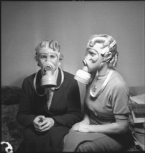 Women with Swiss Gas Masks, 1938.