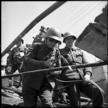 Avalanche in Andermatt; clearing work after thaw; 1951.