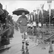SAFFA fair 1958: man dressed as William Tell at procession on Switzerland founding canton's day.