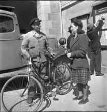 Man and Woman Talking in the Street, Luzern 1951.