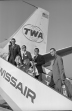 Four employees of the physical department of Berne's university travel to the Antarctic. On an