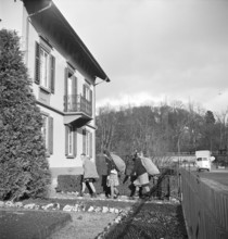 Girls collect fir cones for heating, 1944.