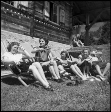 Girl scouts sunbathing, 1952.